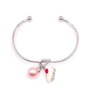 Silver cake and pearl charm cuff bracelet
